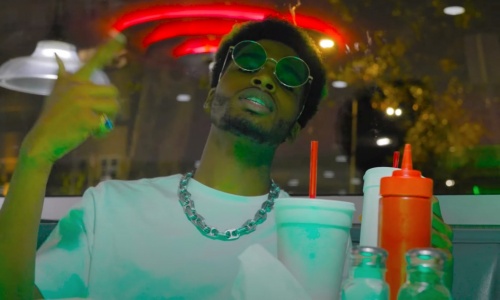 Image: Kye Colors Sees Green In New "Posse On Broadway" Music Video
